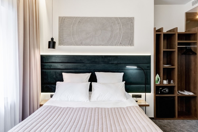 Imagen de la habitación del Hotel Wellion Suharevskiy. Foto 8