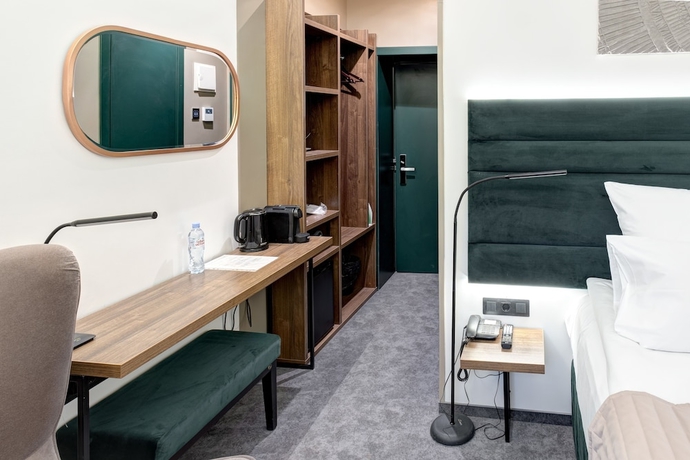 Imagen de la habitación del Hotel Wellion Suharevskiy. Foto 9