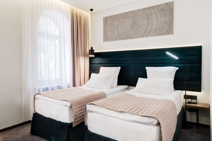 Imagen de la habitación del Hotel Wellion Suharevskiy. Foto 11