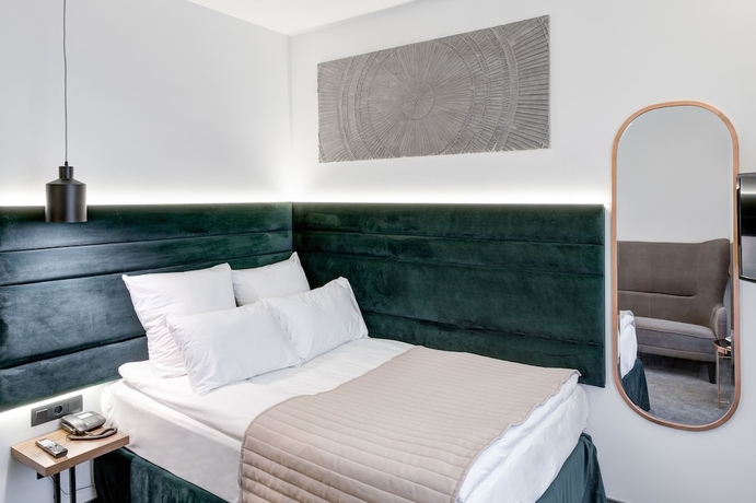 Imagen de la habitación del Hotel Wellion Suharevskiy. Foto 14