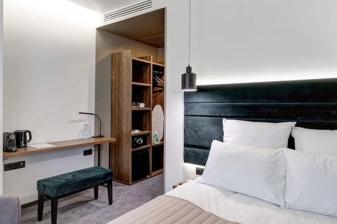 Imagen de la habitación del Hotel Wellion Suharevskiy. Foto 16