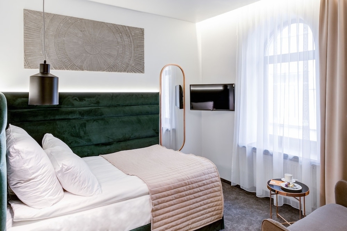 Imagen de la habitación del Hotel Wellion Suharevskiy. Foto 17