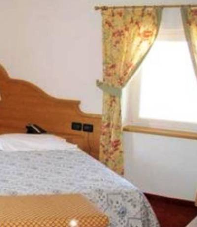 Imagen de la habitación del Hotel Wellness E Resort Stella Delle Alpi. Foto 9