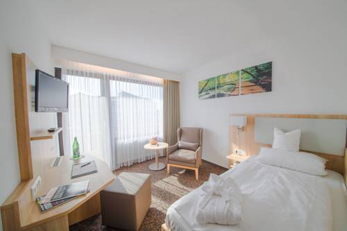 Imagen de la habitación del Hotel Wellness Harms. Foto 11