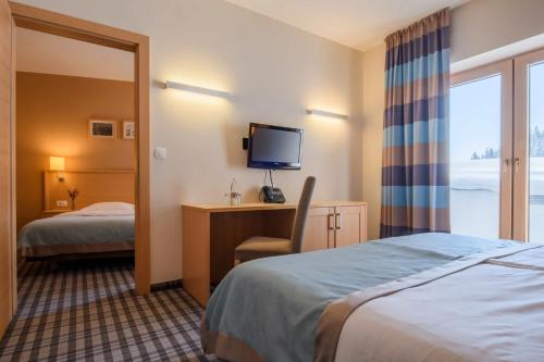 Imagen de la habitación del Hotel Wellness Montis. Foto 6