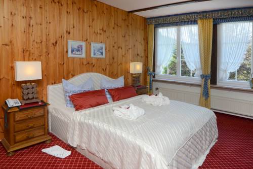 Imagen de la habitación del Hotel Wellness Und Romantik Helmboldt. Foto 5