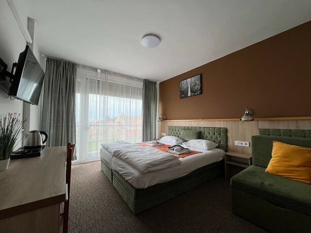 Imagen de la habitación del Hotel Wellness Varfal. Foto 11