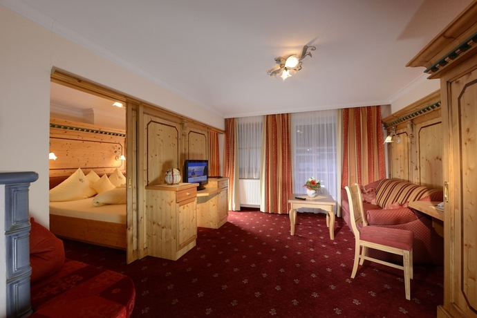 Imagen de la habitación del Hotel Wellness and Beauty Alte Post. Foto 2