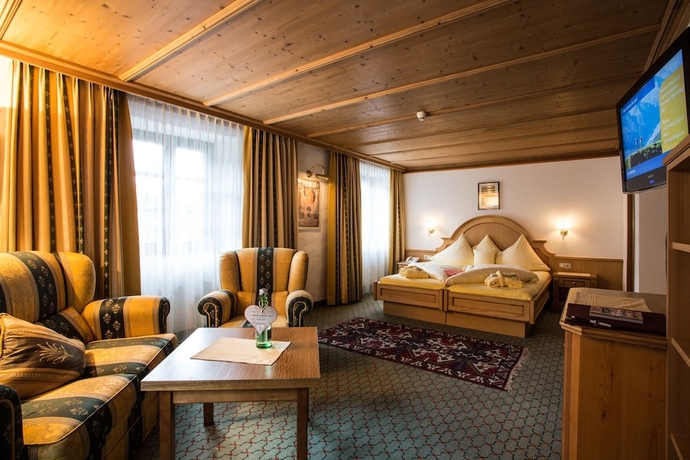 Imagen de la habitación del Hotel Wellness and Beauty Alte Post. Foto 6