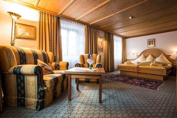 Imagen de la habitación del Hotel Wellness and Beauty Alte Post. Foto 7