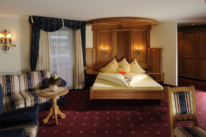 Imagen de la habitación del Hotel Wellness and Beauty Alte Post. Foto 9