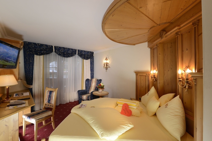 Imagen de la habitación del Hotel Wellness and Beauty Alte Post. Foto 11