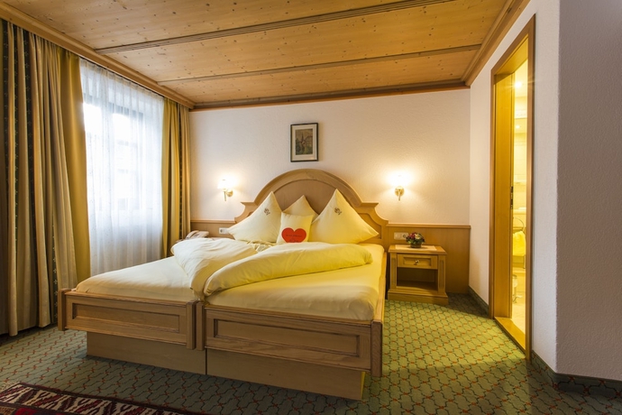 Imagen de la habitación del Hotel Wellness and Beauty Alte Post. Foto 14