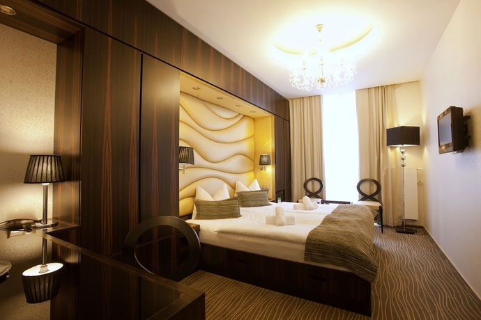Imagen de la habitación del Hotel Wellness and Spa Ambiente. Foto 7