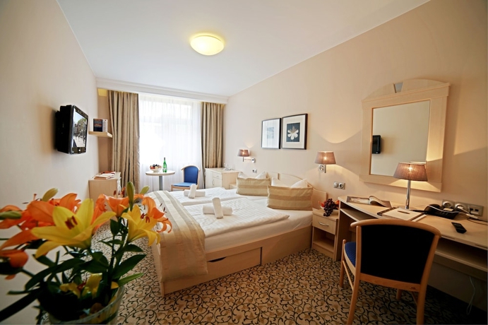 Imagen de la habitación del Hotel Wellness and Spa Ambiente. Foto 10
