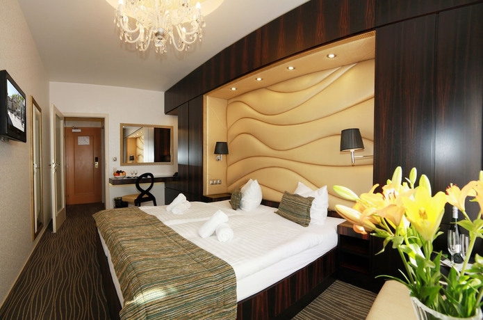 Imagen de la habitación del Hotel Wellness and Spa Ambiente. Foto 12