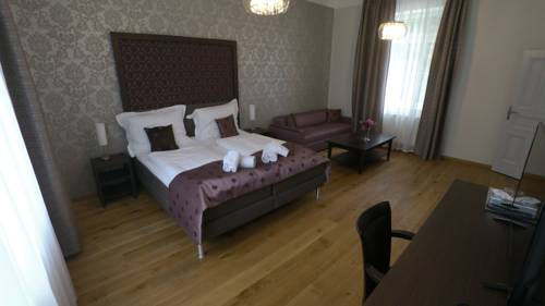 Imagen de la habitación del Hotel Wellness and Spa Villa Regenhart. Foto 3