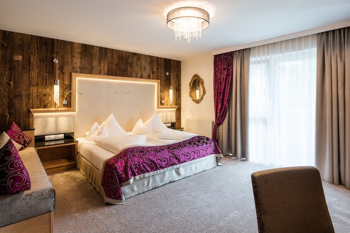 Imagen de la habitación del Hotel Wellnesshotel Cervosa. Foto 13