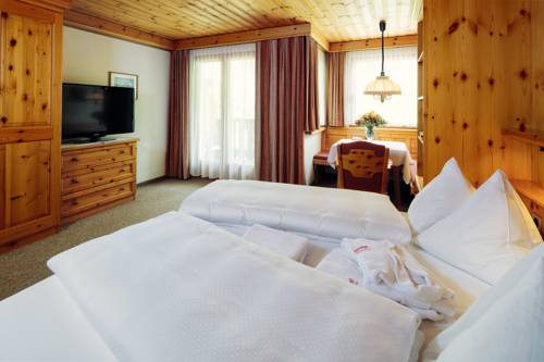 Imagen de la habitación del Hotel Wellnesshotel Engadin. Foto 7