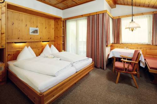 Imagen de la habitación del Hotel Wellnesshotel Engadin. Foto 8