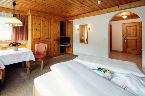 Imagen de la habitación del Hotel Wellnesshotel Engadin. Foto 10