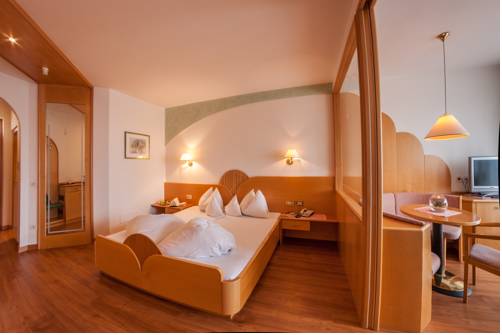 Imagen de la habitación del Hotel Wellnesshotel Glanzhof. Foto 10