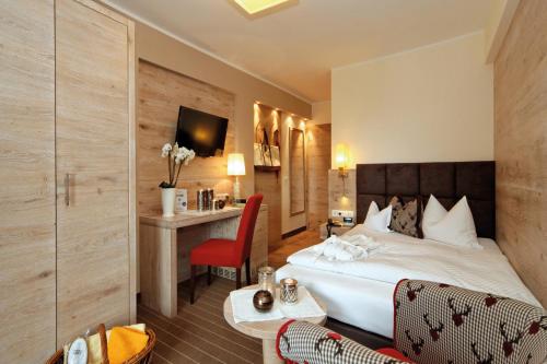 Imagen de la habitación del Hotel Wellnesshotel Jagdhof. Foto 6
