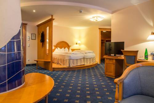 Imagen de la habitación del Hotel Wellnesshotel Wartherhof. Foto 8