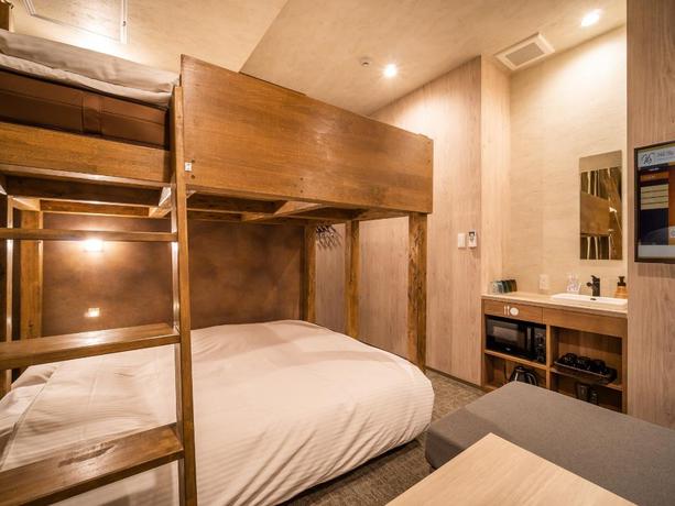 Imagen de la habitación del Hotel Wellstay Namba. Foto 16