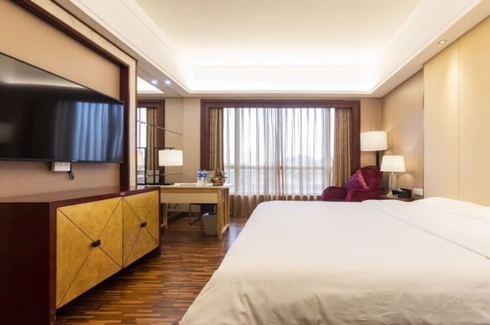 Imagen de la habitación del Hotel Wellton International Dongguan. Foto 17