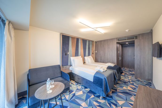 Imagen de la habitación del Hotel Wellton Riverside Spa. Foto 12