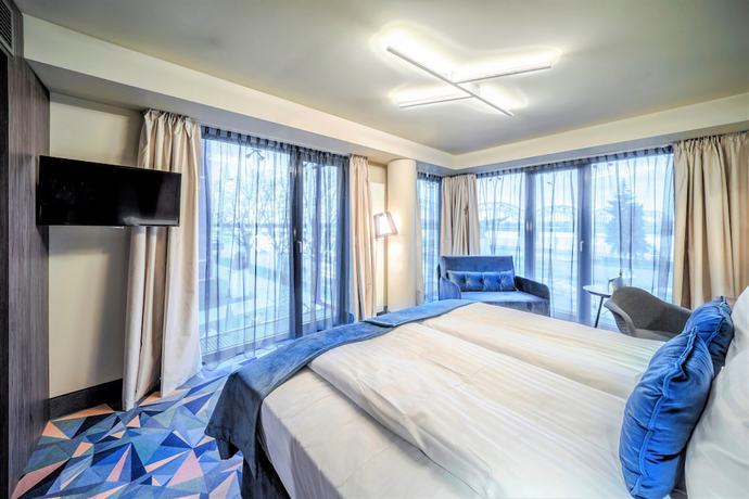 Imagen de la habitación del Hotel Wellton Riverside Spa. Foto 19