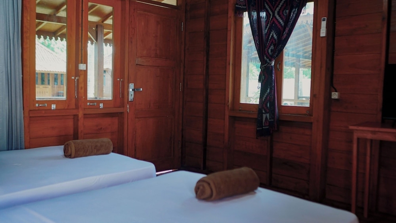 Imagen de la habitación del Hotel Welly Bungalow. Foto 7