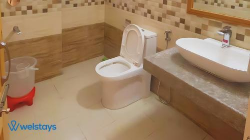 Imagen de la habitación del Hotel Welstays Hadimba Temple. Foto 19