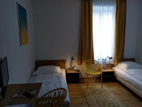 Imagen de la habitación del Hotel Wendelstein, Rosenheim. Foto 19