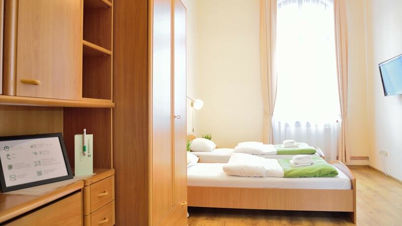 Imagen de la habitación del Hotel Wenderedu Business Center. Foto 12