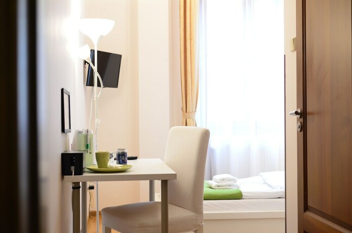 Imagen de la habitación del Hotel Wenderedu Business Center. Foto 15