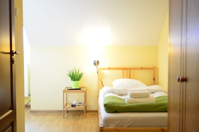 Imagen de la habitación del Hotel Wenderedu Business Center. Foto 16