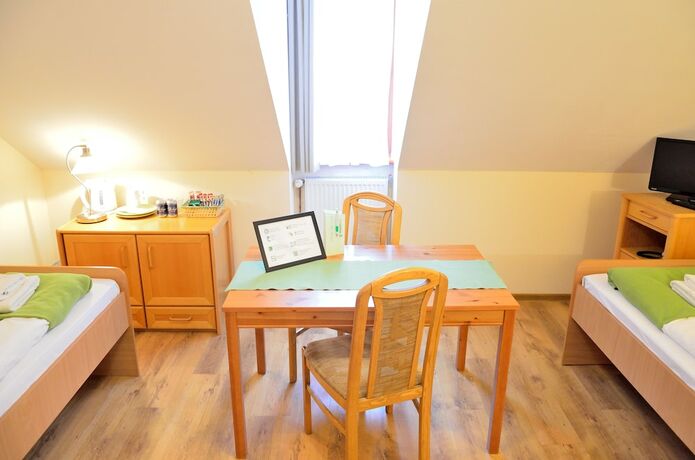 Imagen de la habitación del Hotel Wenderedu Business Center. Foto 18