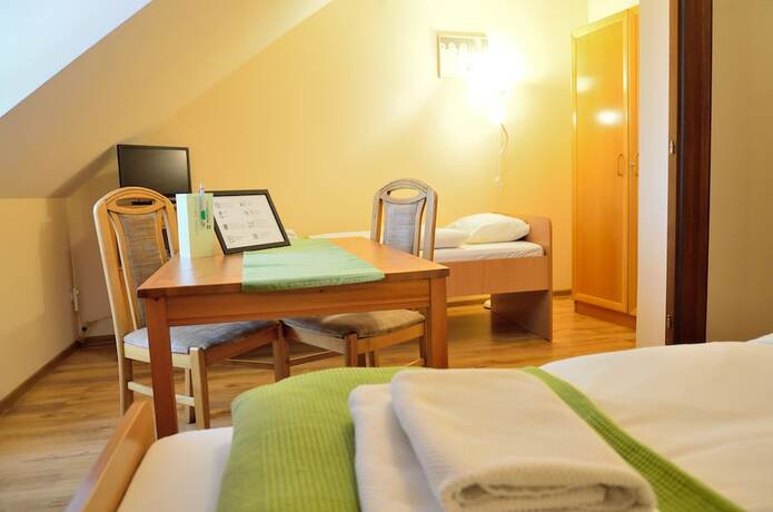 Imagen de la habitación del Hotel Wenderedu Business Center. Foto 25