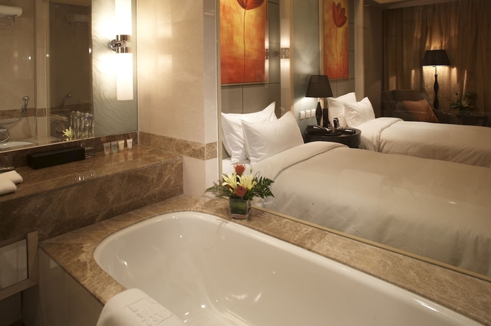 Imagen de la habitación del Hotel Wenjin. Foto 3