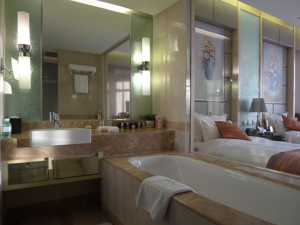 Imagen de la habitación del Hotel Wenjin. Foto 5
