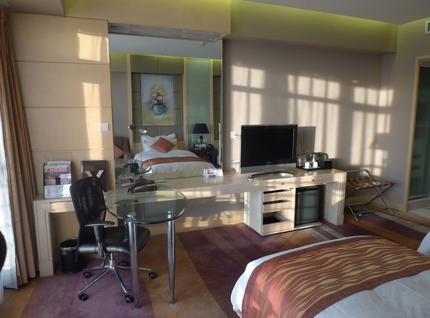 Imagen de la habitación del Hotel Wenjin. Foto 7