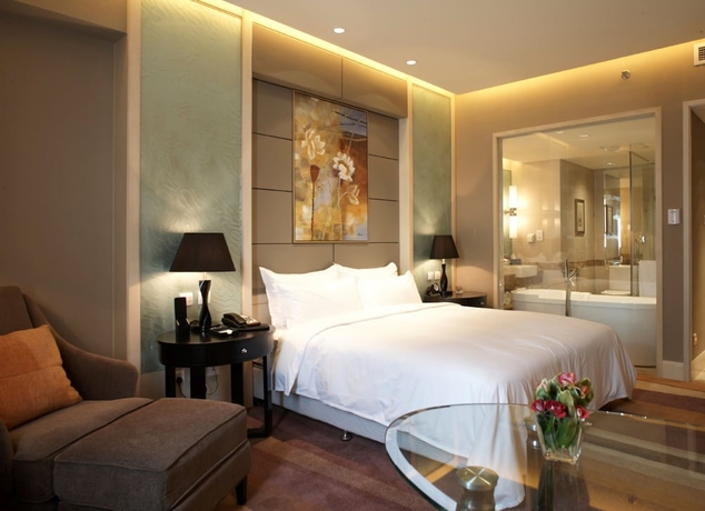 Imagen de la habitación del Hotel Wenjin. Foto 9