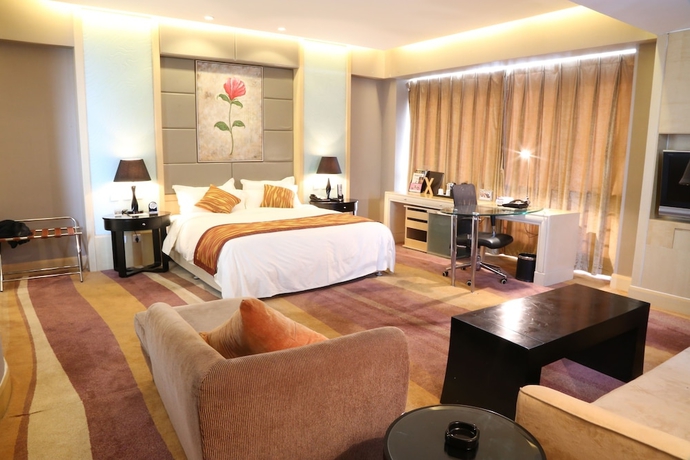 Imagen de la habitación del Hotel Wenjin. Foto 10