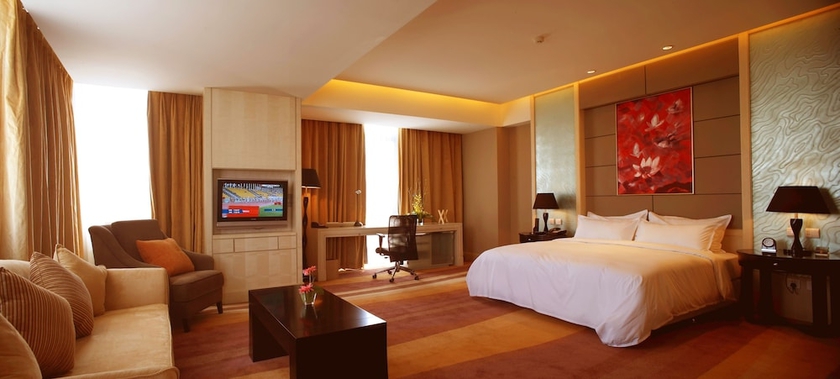 Imagen de la habitación del Hotel Wenjin. Foto 11