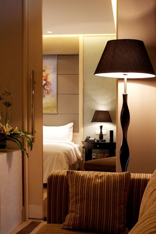 Imagen de la habitación del Hotel Wenjin. Foto 12