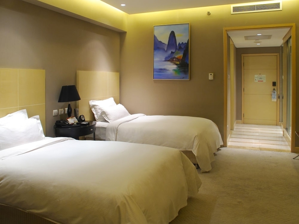 Imagen de la habitación del Hotel Wenjin. Foto 13