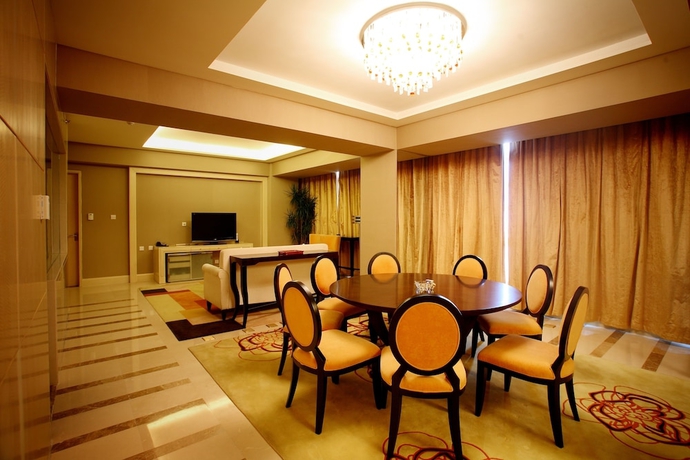 Imagen de la habitación del Hotel Wenjin. Foto 18