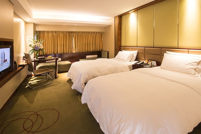 Imagen de la habitación del Hotel Wenling Shuguang. Foto 8